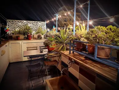 a room filled with lots of potted plants at Casa Cutó near Central Station in Palermo