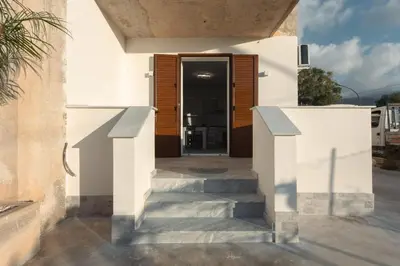 a stairway leading to a door of a house at La Dimora di Icaro - near the sea, the Airport and Palermo in Carini