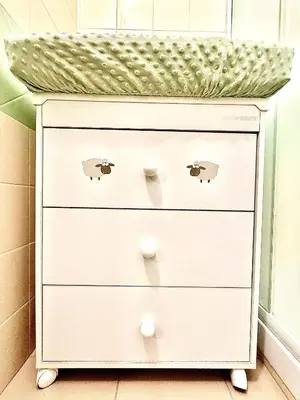 a white dresser with a green roof at Pine Beach House - Villaggio Turistico con Piscina e Animazione in Campofelice di Roccella