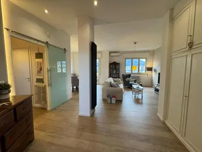 a large living room with a couch and a table at Casa Parlatore in Palermo