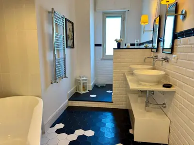 a bathroom with a sink and two sinks at Casa Parlatore in Palermo