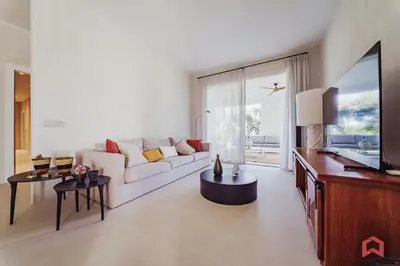 a living room with a couch and a tv at Strepitosa Villa Vista Mare con Piscina Privata in Terrasini