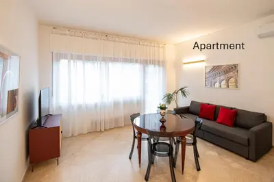 a living room with a couch and a table at Accordi al Politeama in Palermo