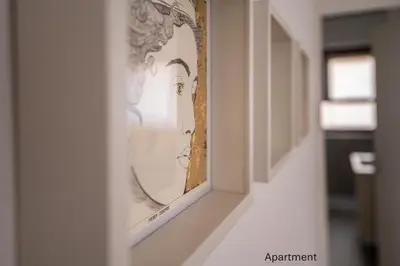 a framed picture of a woman on a wall at Accordi al Politeama in Palermo