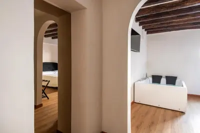 a bathroom with a sink and a mirror at Vittorio Emanuele Suites&Apartments in Palermo