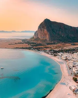 an aerial view of a beach with a mountain at Le case di Palma in San Vito lo Capo