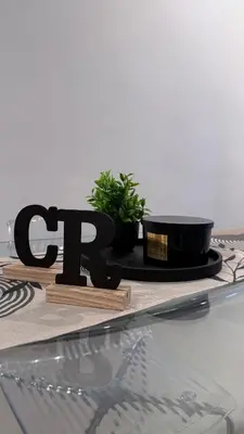 a living room with a couch and a tv at CR Home in Palermo