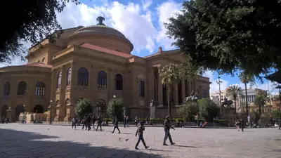 a group of people walking in front of a building at Marku's House in Palermo