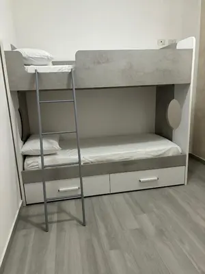 a bunk bed with two bunk beds in a room at BALISTRERI HOUSe in Trabia
