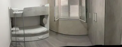 a small room with a bunk bed and a window at BALISTRERI HOUSe in Trabia