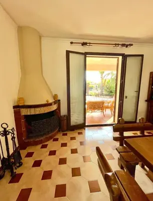 a staircase with a metal railing in a house at Villa Seaside in Cinisi