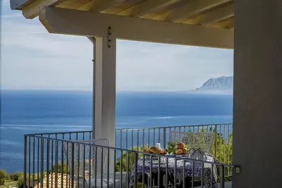 a balcony with a view of the ocean at APT Marta in Villa Rosaria Vista Mare Zingaro in Scopello