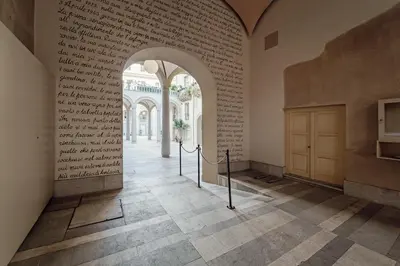 a large vase sitting in the middle of a building at Hybrid Icon Rooms Gallery City Center in Palermo
