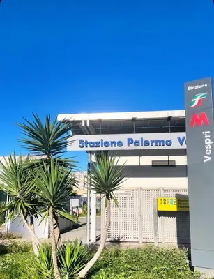 a sign for a stanford palomo gas station at Aurea Suites in Palermo