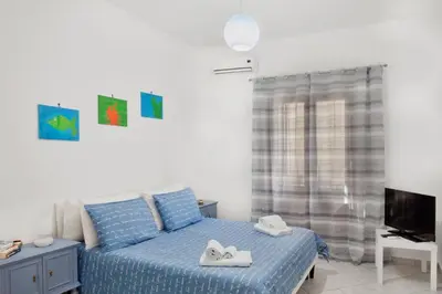 a bedroom with a bed with two white towels on it at Zagarellai apartment alla Kalsa Fast wi-fi in Palermo