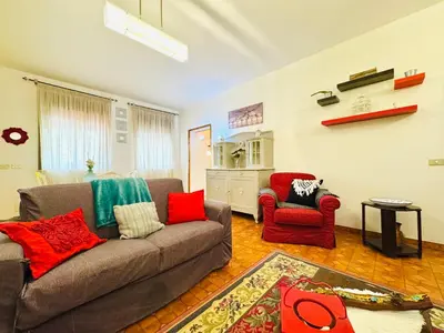 a living room with a couch and two chairs at O Firrìu in Carini