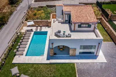 an aerial view of a house with a swimming pool at Villa Coraline - Castellammare in Balata di Baida