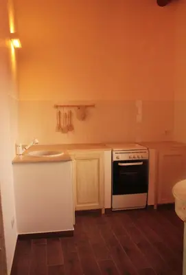 a kitchen with a stove and a sink at Agriturismo Masseria Castellana in Monreale