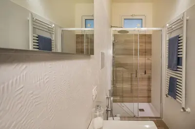 a bathroom with a shower and a sink at Rosvì Villa in Castellammare del Golfo