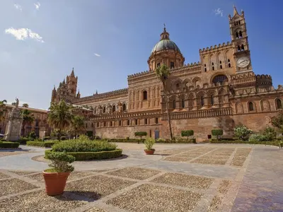 a large building with a clock tower on top of it at Apartment Happy House by Interhome in Palermo