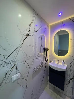 a bathroom with a sink and a mirror at Cappellieri centro apartament in Palermo