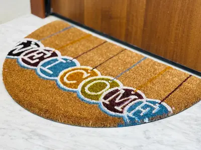 a brown rug with different colored designs on it at Sampolo Rooftop - Palermo View in Palermo