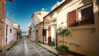 an alley in an old town with buildings at Charming Loft near the Sea - Castellammare del Golfo by Sicily Home Solutions in Castellammare del Golfo