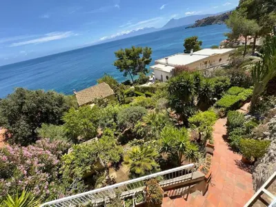 an aerial view of a house and the ocean at Sicily Sea Villa Capo Zafferano in Santa Flavia