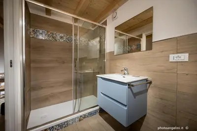 a bathroom with a shower and a sink at Borgo La Chiusa in Castellammare del Golfo