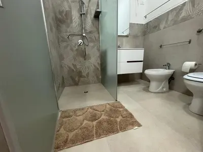 a bathroom with a shower and a toilet at Apartment für 6 oder 7 Personen by Interhome in Balestrate