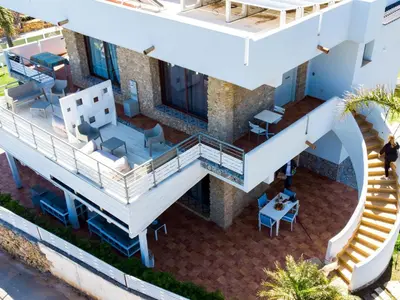 an aerial view of a house with a balcony at Apartment Lila Wohnung mit Schwimmbad und Meerblick by Interhome in Balestrate