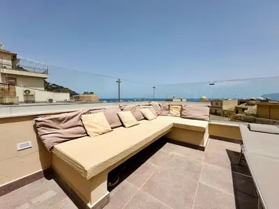 a couch sitting on top of a roof at Apartment GS Urlaub del Golfo Haus mit Jacuzzi by Interhome in Castellammare del Golfo
