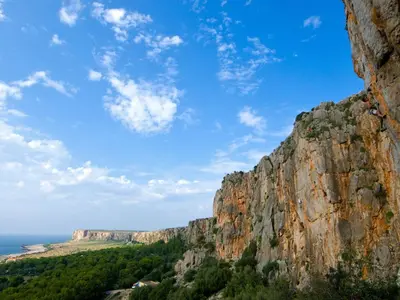 a view of a mountain with the ocean in the background at Apartment Casa Sterlizia bei Holiday World by Interhome in San Vito lo Capo
