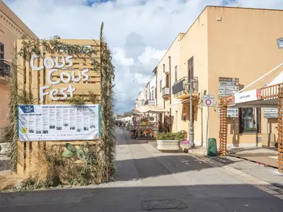 a street with a sign on the side of a building at Apartment Casa Sterlizia bei Holiday World by Interhome in San Vito lo Capo
