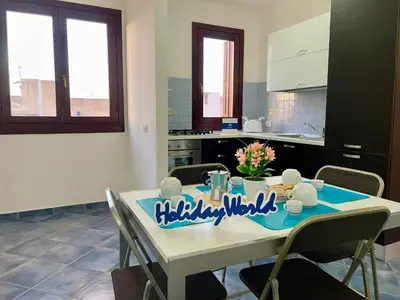a table with a happy birthday sign on it in a kitchen at Apartment Casa Sterlizia bei Holiday World by Interhome in San Vito lo Capo