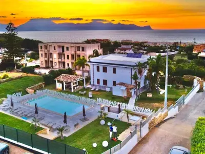 an aerial view of a resort with a swimming pool at Apartment Wohnung Glicine mit Schwimmbad und Meerblick by Interhome in Balestrate