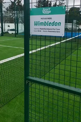 a sign on a fence in a baseball field at Holiday Home in Partinico mit Privatem Pool by Interhome in Balestrate
