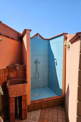a bathroom with a shower and a sink at Holiday Home Villa mit Wasserblick by Interhome in Campofelice di Roccella