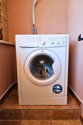 a white washing machine in a corner of a room at Holiday Home Villa mit Wasserblick by Interhome in Campofelice di Roccella