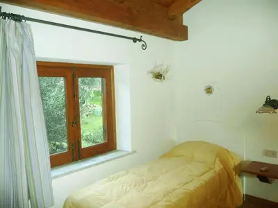 a bedroom with a bed and a window at Holiday Home 'Suite Ficodindia by Interhome in Santa Flavia