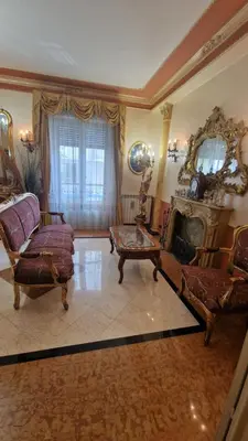 a living room with a couch and a fireplace at Casa mogia in Palermo