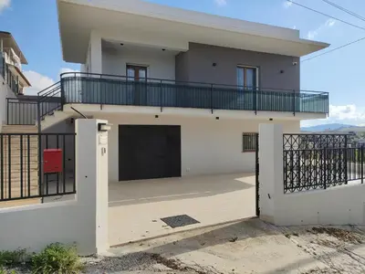 a house with a balcony on top of it at Brezza Marina in Alcamo