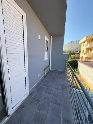 a balcony of a house with a door at Cala38 in Terrasini