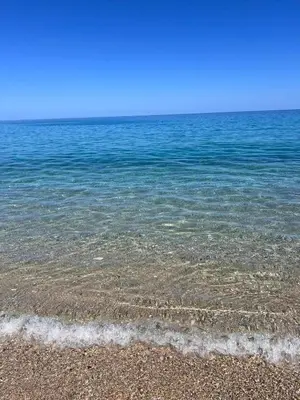 a view of the ocean from the beach at Auri's home in Palermo
