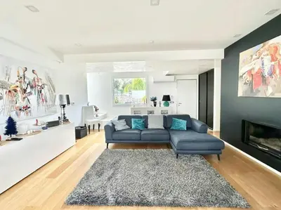a living room with a couch and a fireplace at Villa With Citrus Grove Near Caccamo in Termini Imerese