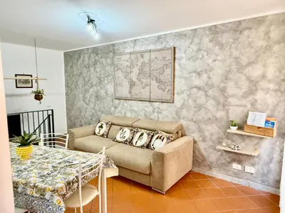 a living room with a couch and a table at Dal Moro in Palermo