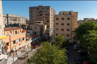 a view of a city with tall buildings at La Luna di Noah al Massimo in Palermo
