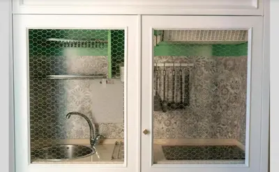 a kitchen with a sink and a shower at La Luna di Noah al Massimo in Palermo