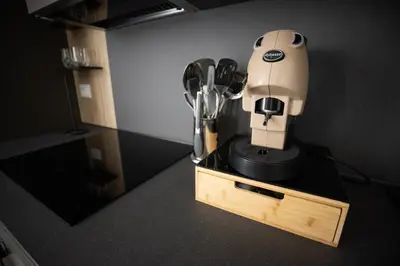 a coffee maker with a dog head on top of it at Richgood Luxury homes - Villa Zefira sole in Altavilla Milicia
