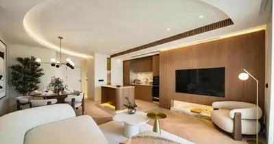 a bedroom with a bed and a table and a plant at Bella Vista Residence in Palermo